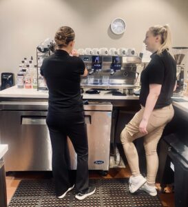 Program participants working at the cafe.